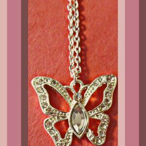 Silver In Color Butterfly Design Necklace With Clear Crystals